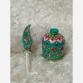 سرمه دان استخوان شتر با نقاشی گل و بوته . الوان .